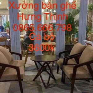 Armchair gỗ nệm be bàn tròn chân chéo
